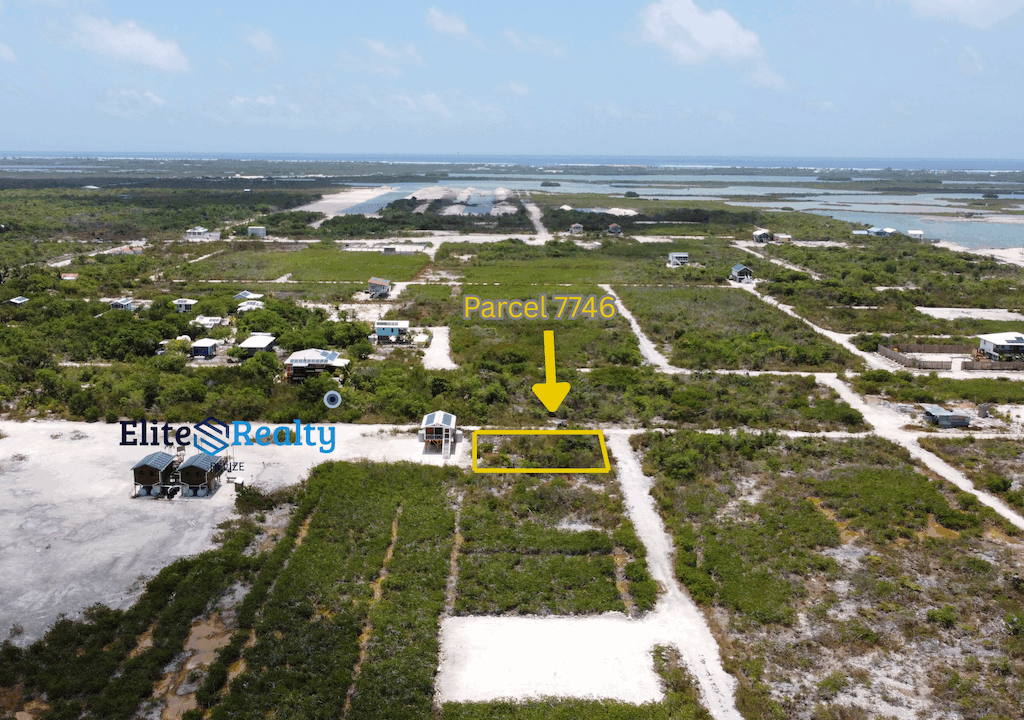 Aerial View Of Parcel 7746 Highlighted With Arrow Showing Exact Lot Location Near Road And Lagoon In Ambergris Caye Belize