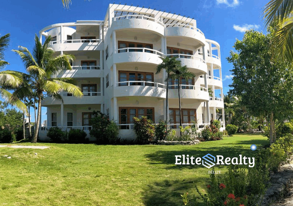 Condo Building At Brahma Blue Resort With Landscaped Grounds And Open Green Space In San Pedro Belize