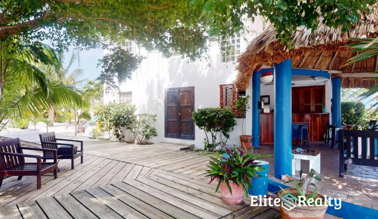 Outdoor Palapa Bar And Seating Area At Brahma Blue Resort San Pedro Belize