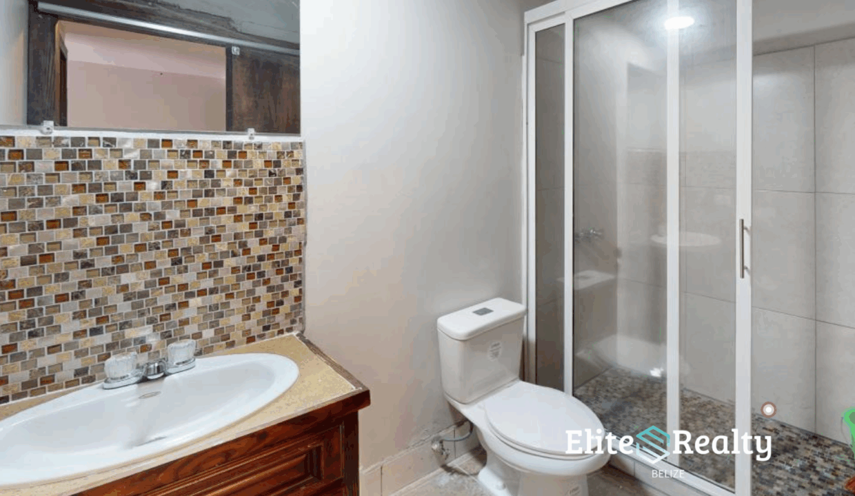 Bathroom With Glass Shower Inside 1 Bedroom Condo At Royal Palm Resort In San Pedro Ambergris Caye Belize