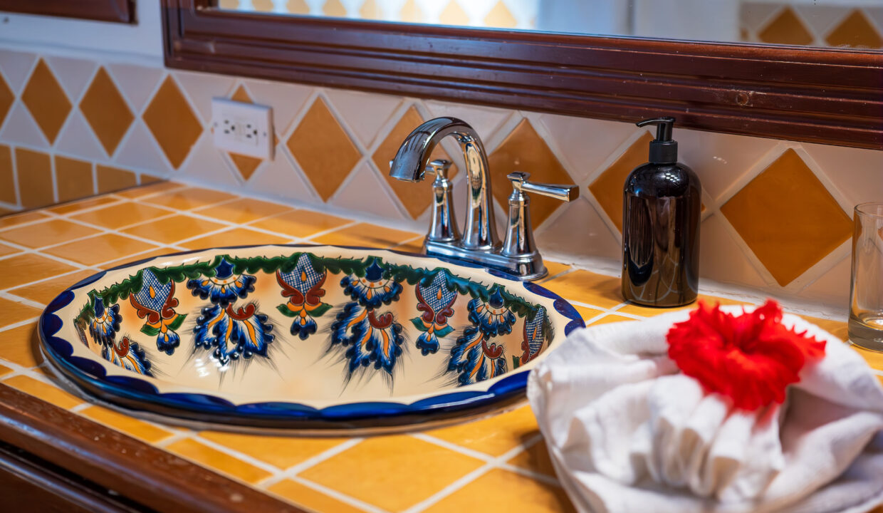 Custom Handcrafted Sink With Decorative Tile Countertop At Hopkins Bay Resort Belize Luxury Caribbean Villa Bathroom Detail