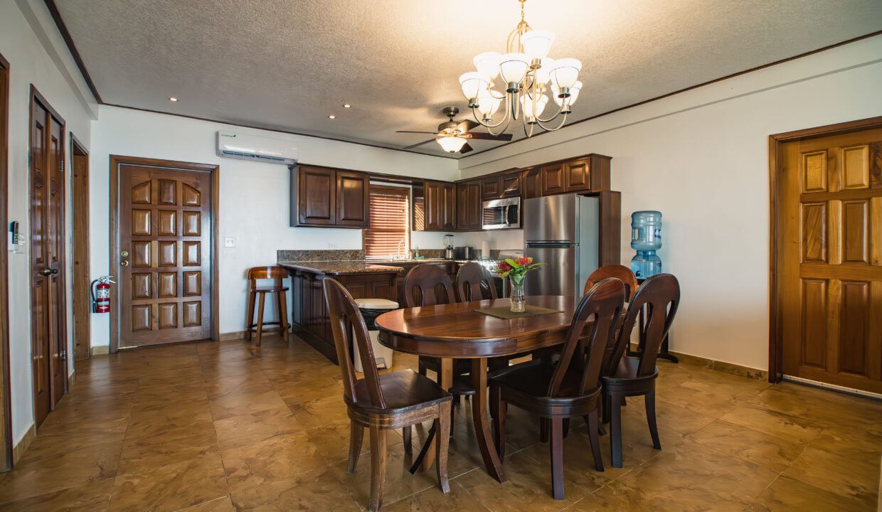 Dining Area With Fully Equipped Kitchen At Hopkins Bay Resort Belize Luxury Caribbean Villa Interior With Open Layout