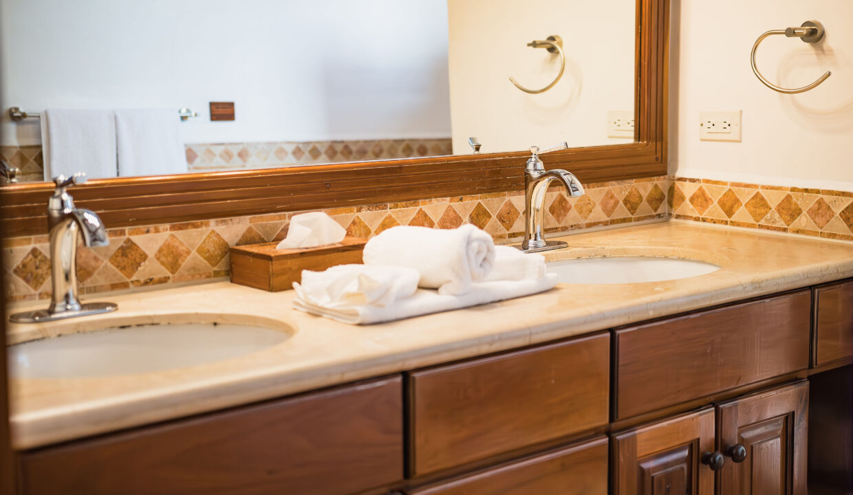 Double Sink Bathroom Vanity With Wooden Cabinetry At Hopkins Bay Resort Belize Luxury Caribbean Villa Interior