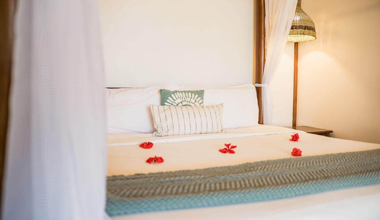 Elegant Bedroom Styling With Canopy Bed And Tropical Decor At Hopkins Bay Resort Belize Luxury Caribbean Villa