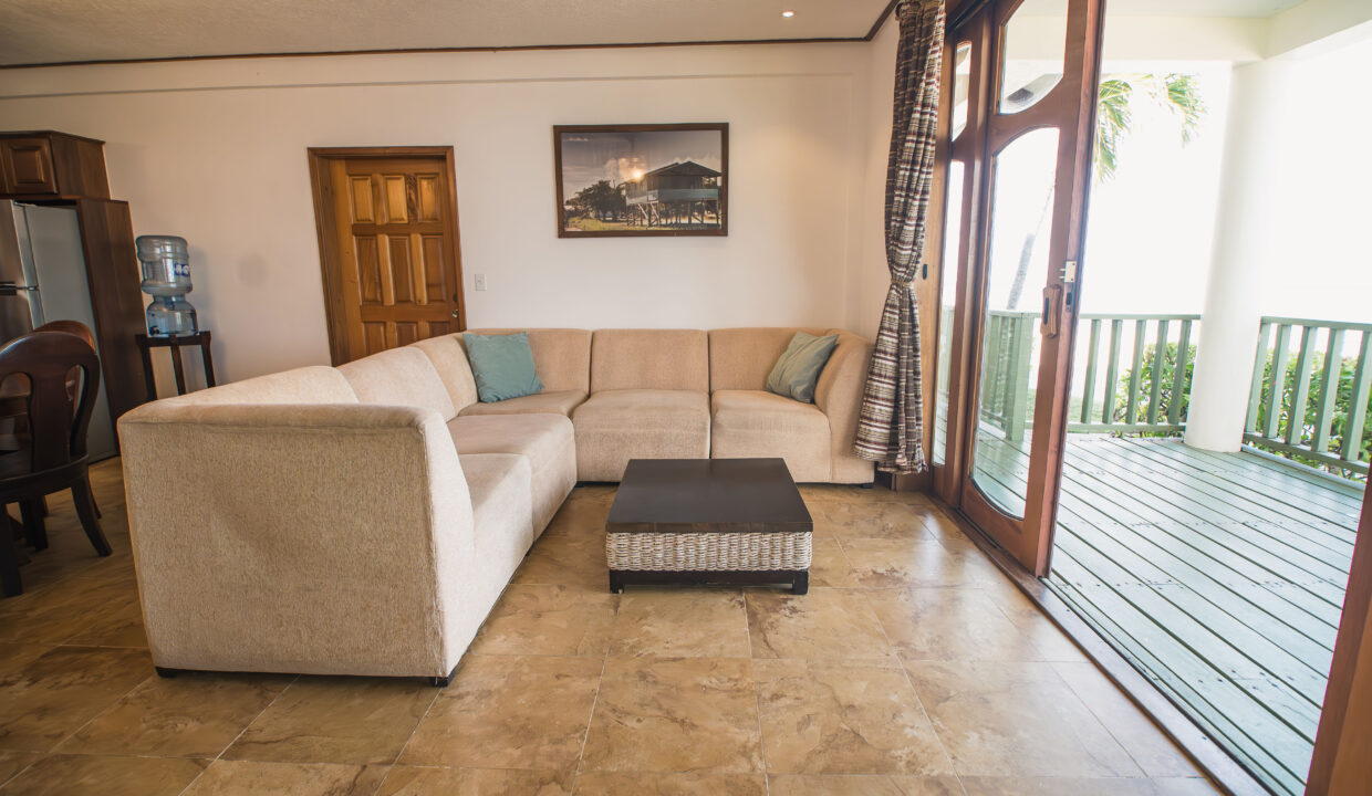 Living Room With Balcony Access At Hopkins Bay Resort Belize Luxury Caribbean Villa With Indoor Outdoor Living Space