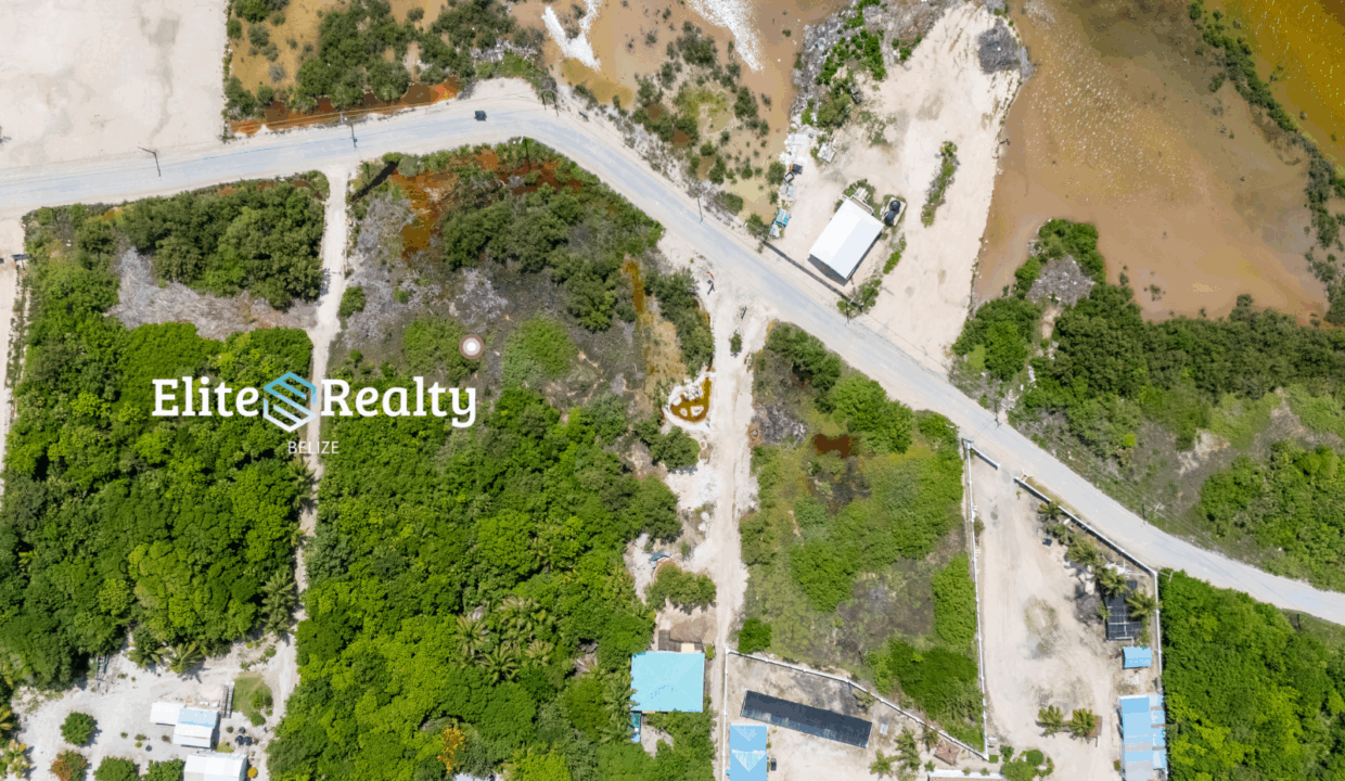 Top View Aerial Of Road Access Lots Near Lagoon And Residential Area In Ambergris Caye Belize