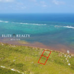 Aerial angle of beachfront lot outlined in red on North Ambergris Caye Belize showing shoreline and reef views near San Pedro.