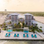 Beachfront resort villas with dock and lounge area in Ambergris Caye Belize