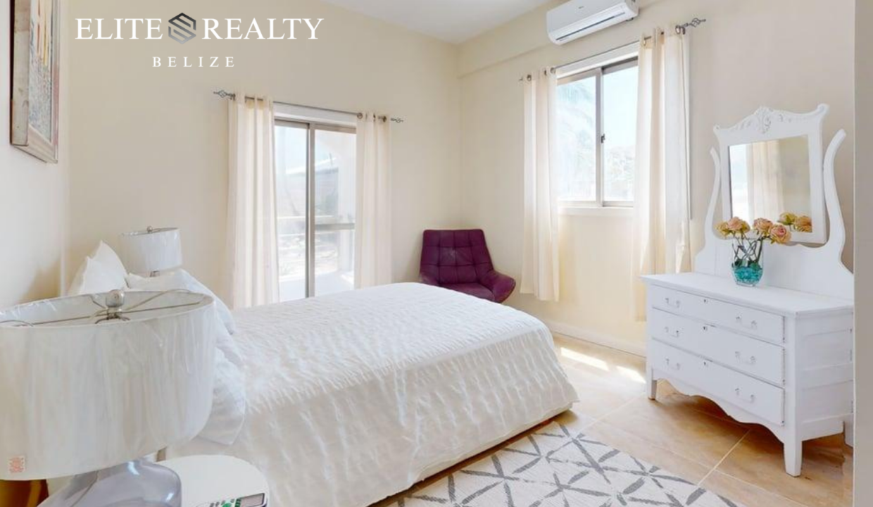 Bedroom With Natural Light Inside Beachfront Condo At Blue Water Beach Resort San Pedro Ambergris Caye Belize