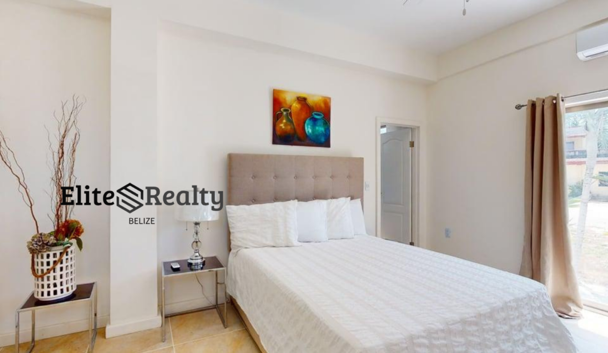 Guest Bedroom With Natural Light Inside Beachfront Condo At Blue Water Beach Resort San Pedro Ambergris Caye Belize
