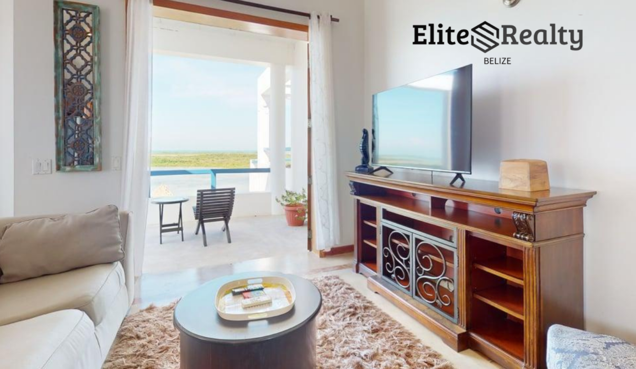 Living Room With Balcony And Lagoon Views At Brahma Blue Penthouse In San Pedro Ambergris Caye Belize
