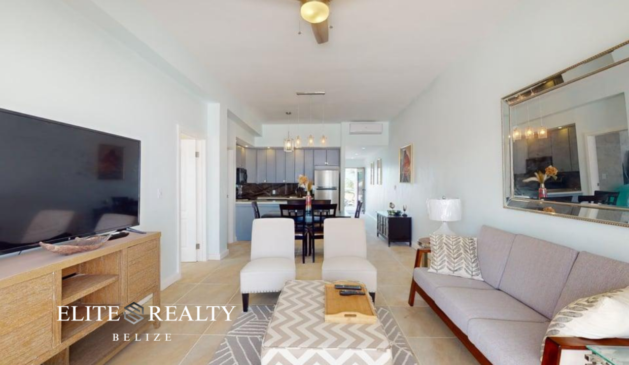 Open Concept Living Room With Dining And Kitchen Area Inside Beachfront Condo At Blue Water Beach Resort San Pedro Ambergris Caye Belize