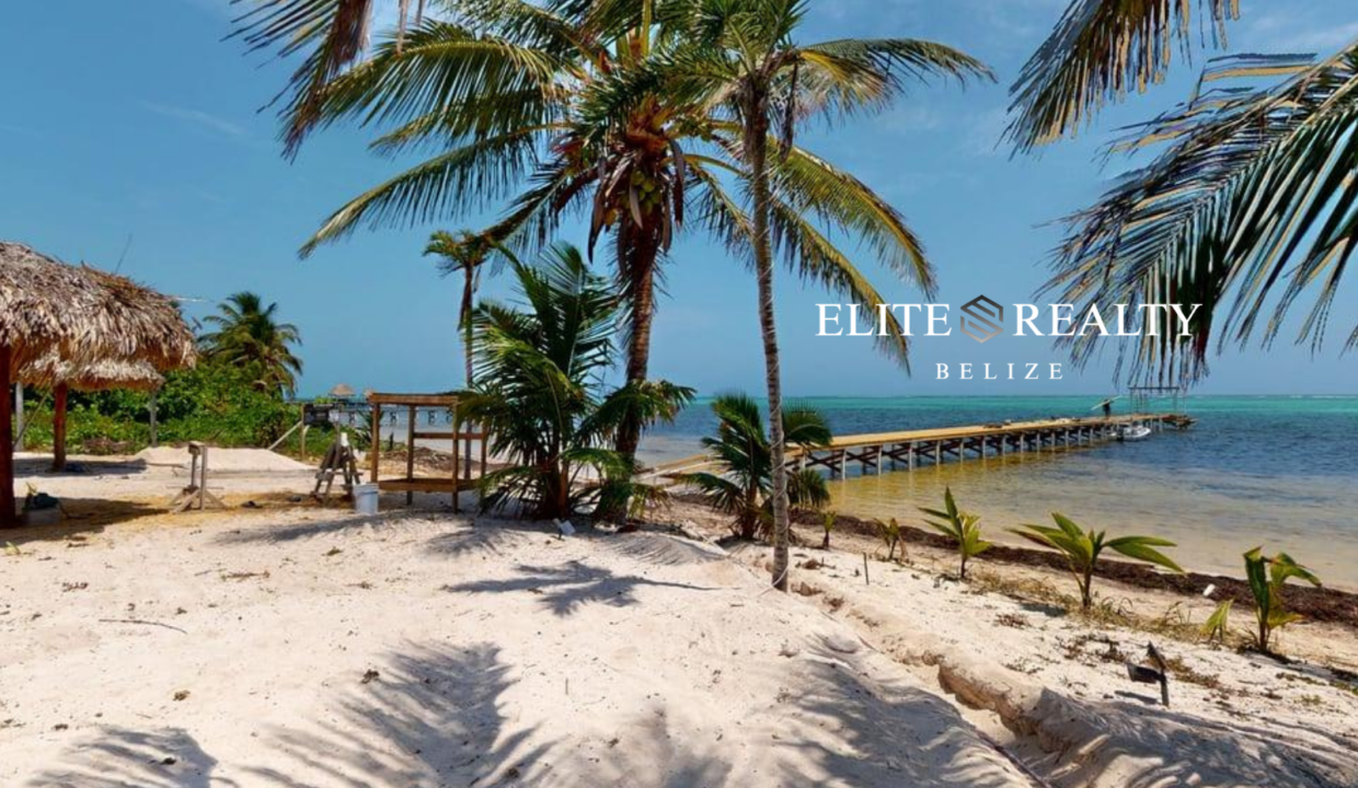 Private Beach And Pier At Blue Water Beach Resort In San Pedro Ambergris Caye Belize With Palm Trees And Caribbean Sea