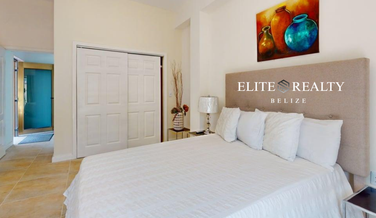 Spacious Bedroom With King Bed And Closet Inside Beachfront Condo At Blue Water Beach Resort San Pedro Ambergris Caye Belize