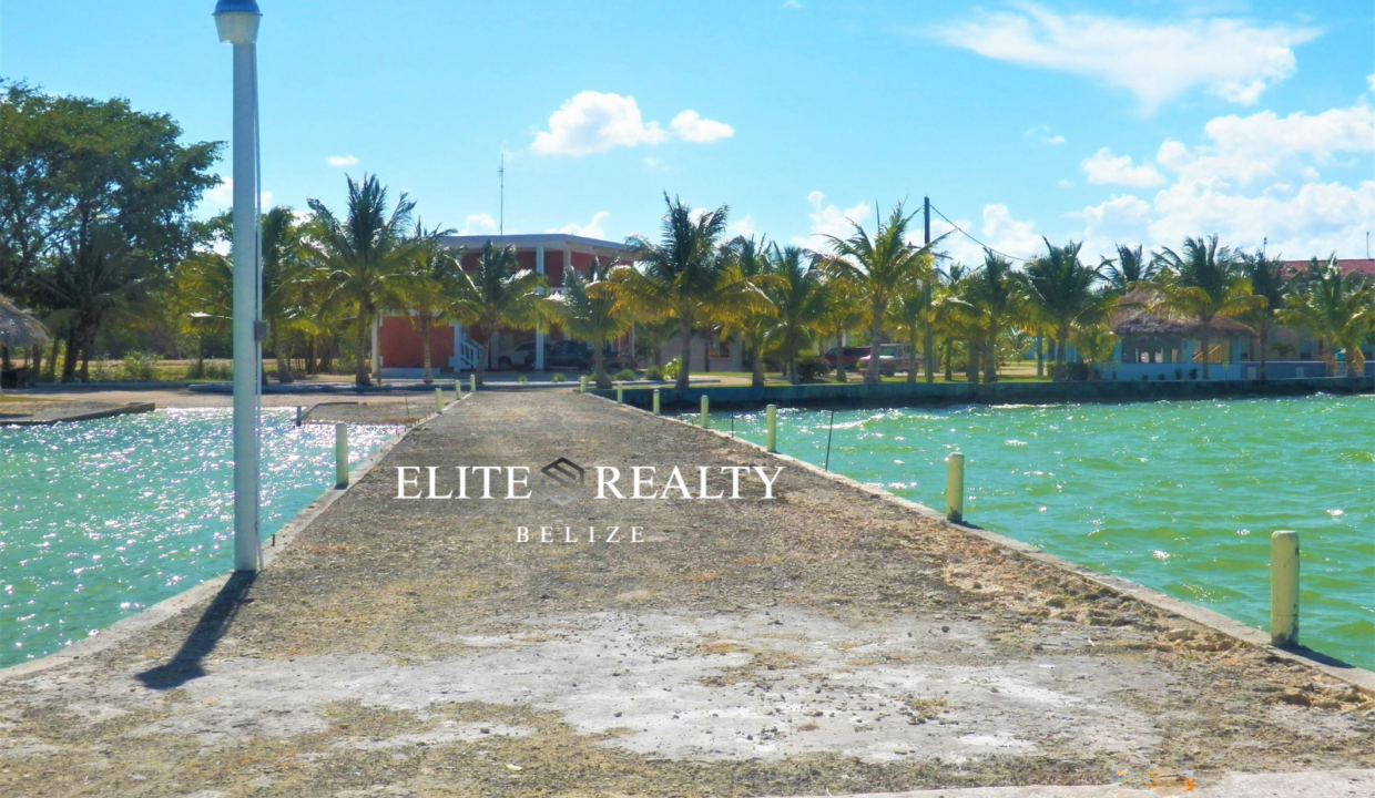 Community Dock Extending Into Four Mile Lagoon At Tarpon Cove Estates In Corozal Belize