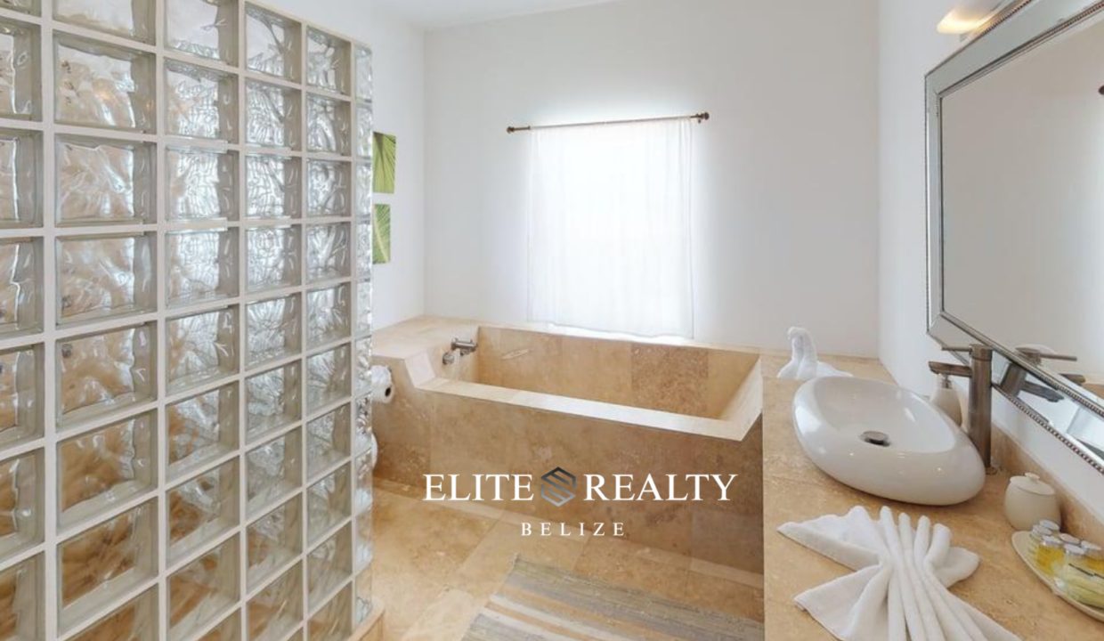 Luxury Bathroom With Soaking Tub And Glass Block Shower In Playa Villa 2 Waterfront Villa San Pedro Ambergris Caye Belize