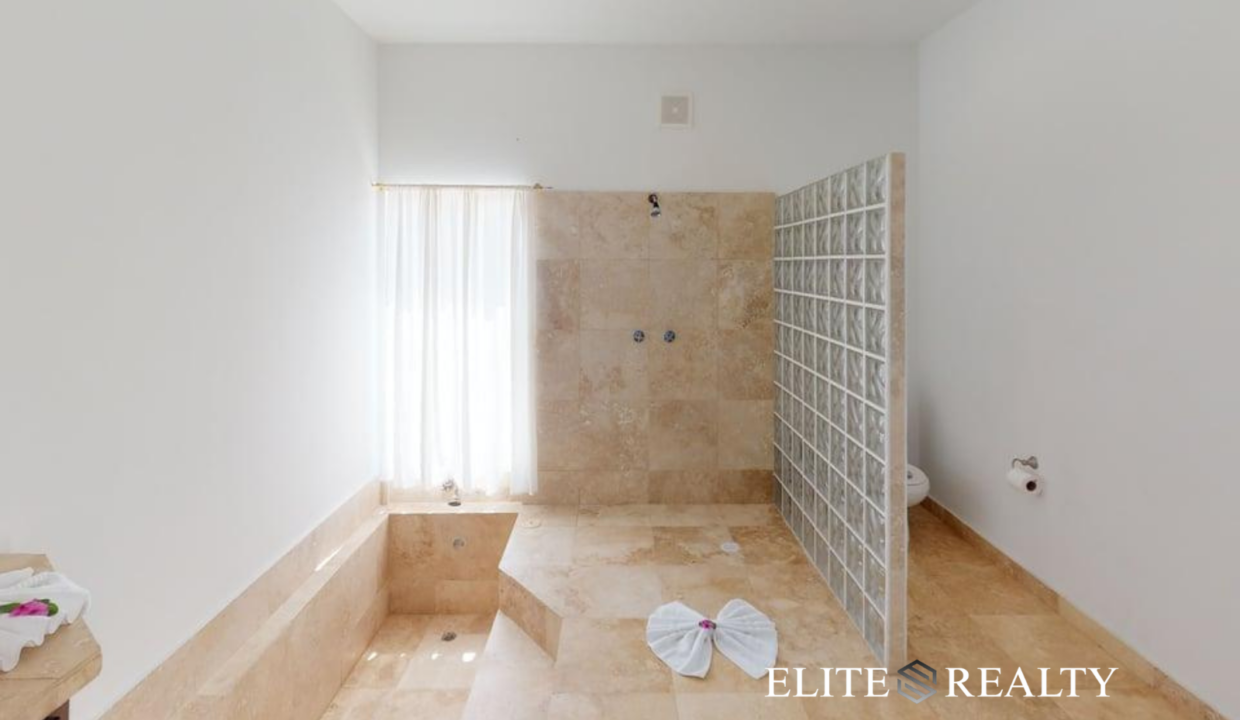Luxury Bathroom With Soaking Tub And Glass Block Walk In Shower In Playa Villa 2 Waterfront Villa San Pedro Ambergris Caye Belize