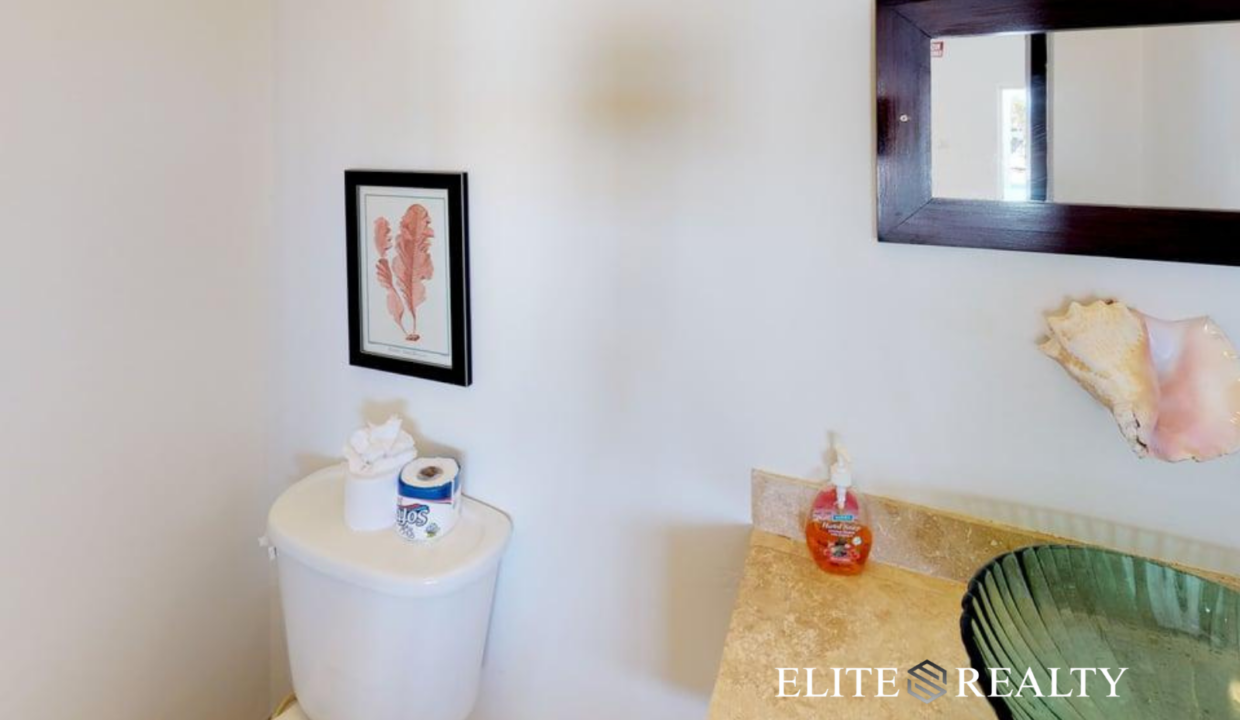 Modern Powder Room With Glass Vessel Sink In Playa Villa 2 Luxury Waterfront Villa San Pedro Ambergris Caye Belize