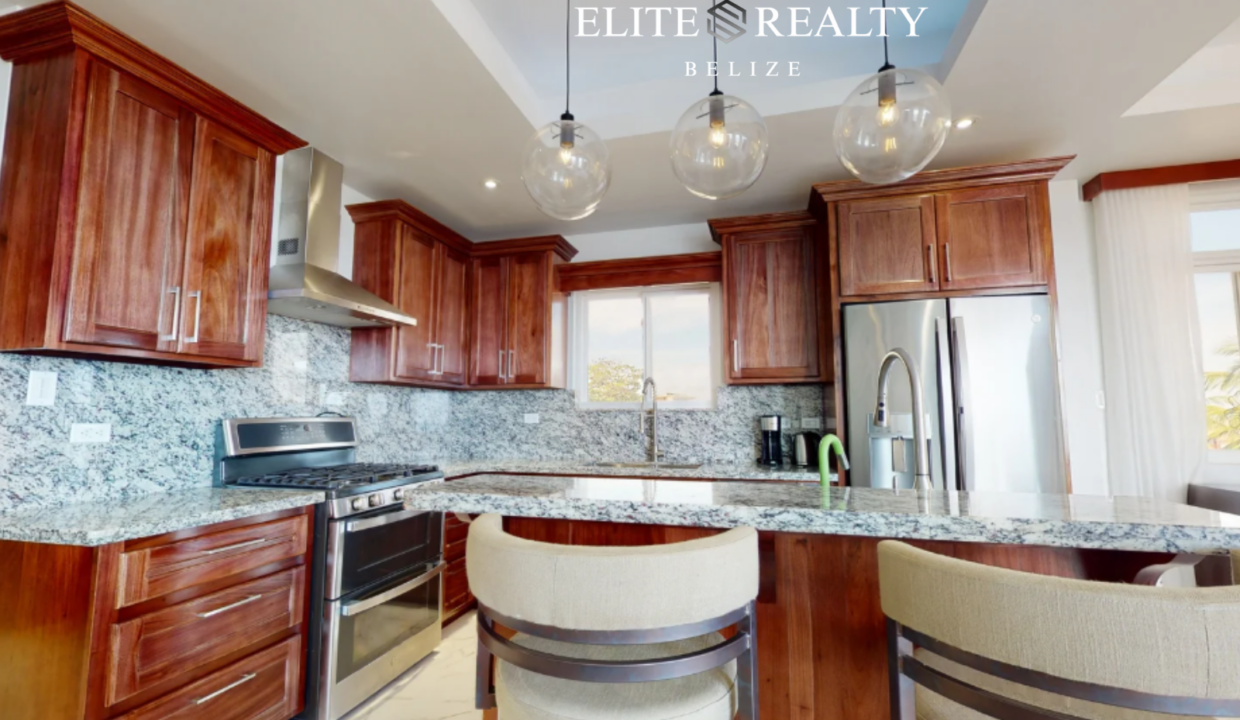 Open Concept Condo Kitchen Breakfast Bar Royal Kahal Resort San Pedro Belize Ambergris Caye Beachfront Condo For Sale