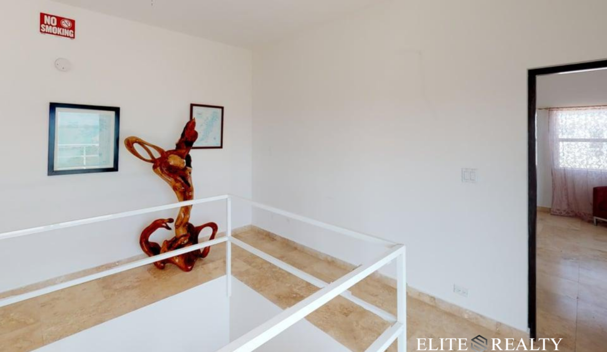 Upper Floor Hallway Landing With Stair Railing In Playa Villa 2 Luxury Waterfront Villa San Pedro Ambergris Caye Belize